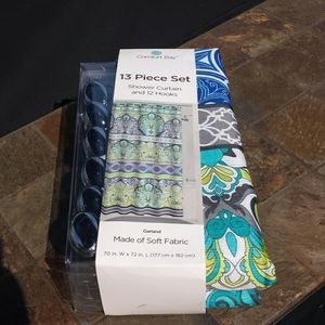Comfort Bay Fabric curtain and hooks set.